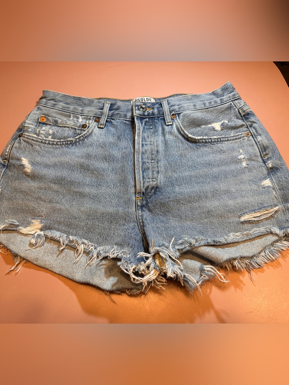 Agolde Light Wash Distressed Denim Cutoff Shorts
